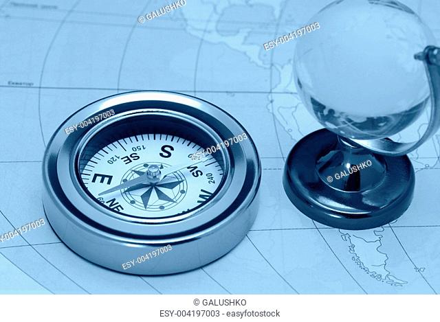 Compass and glass globe