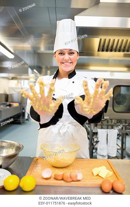 Baker showing her sticky hands