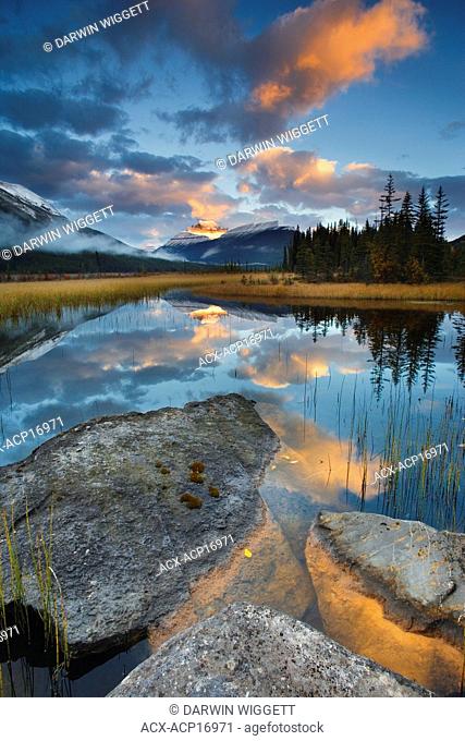 Scenic with water reflections of Rampart Ponds and Mount Athabasca, Banff National Park, Alberta, Canada