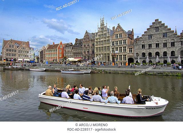 Cruise vessel, guild houses, river Leie, old town of Ghent, East Flanders, Belgium