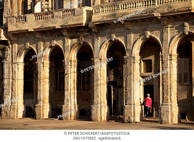 dilapidated facades and columns of Malecon in Havana, Cuba, Caribbean
