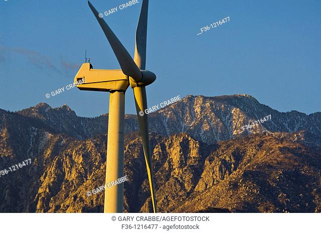Windmill at wind farm at sunrise, below the San Jacinto Mountains, Palm Springs, California