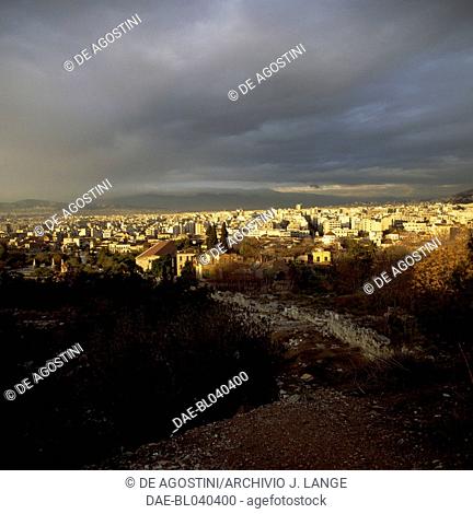 The city of Athens at sunset, seen from Pnyx hill, Greece