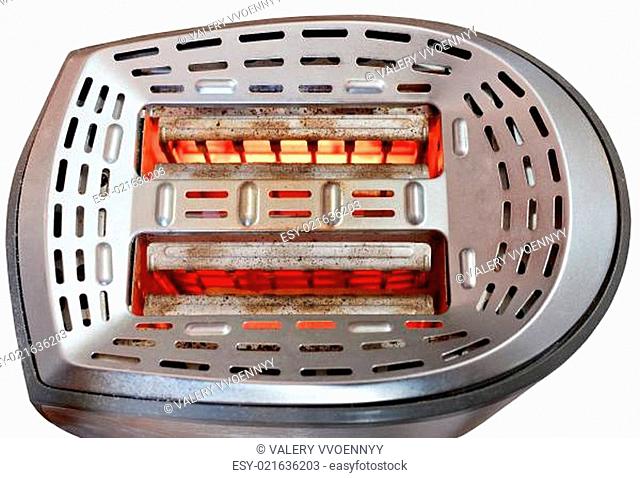 two slices of bread toasting in metal toaster