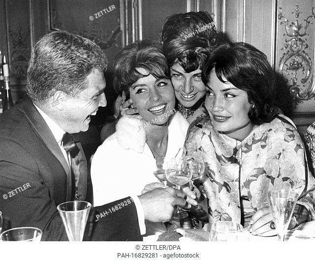 (Lr): Helmut Schmid, Sonja Ziemann, Maria Brauner and Ellen Schwiers during a wine tasting at the Grunewald Hotel on the occasion of the International Film...
