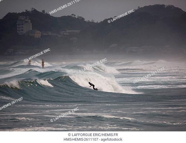 Japan, Fukushima Prefecture, Tairatoyoma Beach, japanese surfer in the contaminated area after the daiichi nuclear power plant irradiation