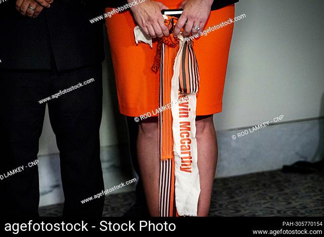Sara Knizhnik, of the Lake County, Illinois, State€™s Attorney€™s Office holds a sash with the name of Kevin McCarthy during a press conference following a...
