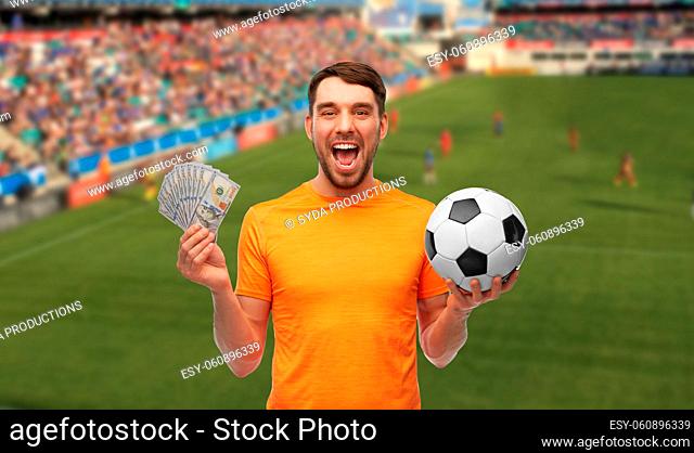 happy football fan with soccer ball and money