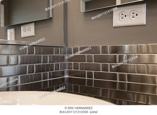 Metallic backsplash in bathroom; Murrieta; California; USA