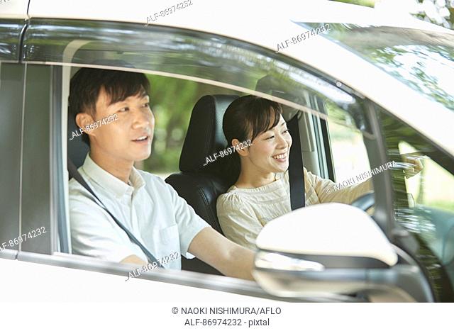 Japanese couple in the car