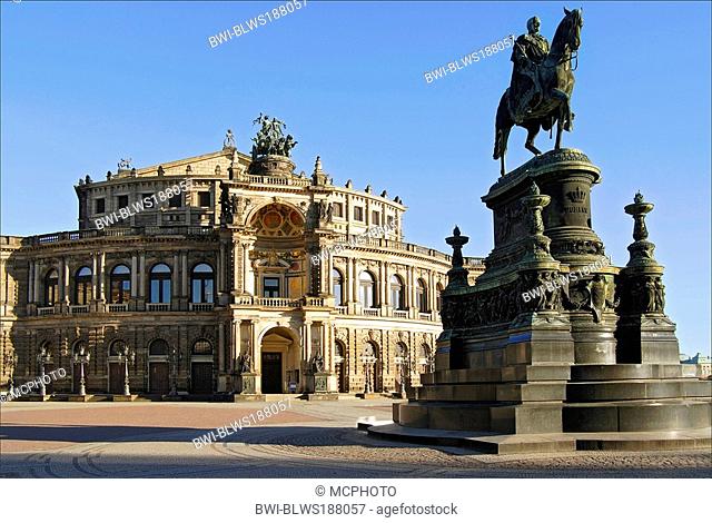 historic Semper Oper in the old town of Dresden with the staue of King Johann in front, Germany, Saxony, Dresden