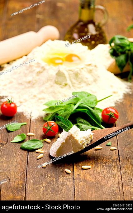 Various ingredients for homemade italian ravioli with ricotta cheese