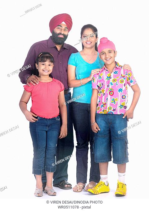 Sikh parents with children MR702X, 702Y, 702Z, 779A