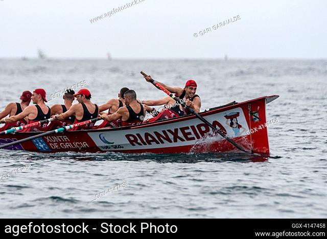 Crew of CR Cabo da Cruz rowing boat in action during XV Bandera Fabrika men’s regatta of the ACT League (The Association of Clubs of rowing boats) in La Concha...