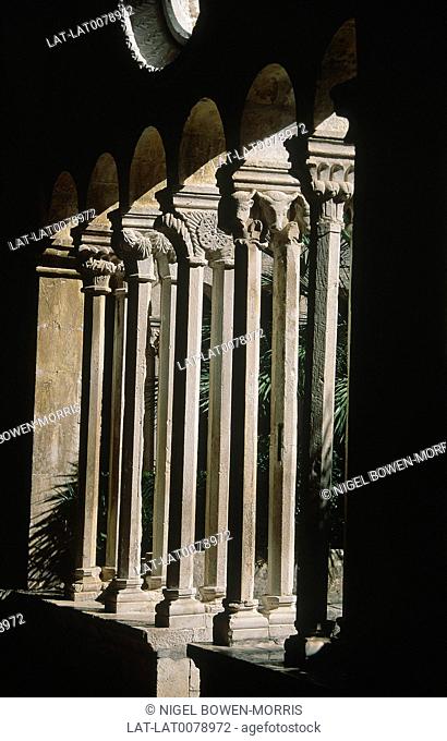 Franciscan Monastery. Pillars in cloister corridor. Shadows