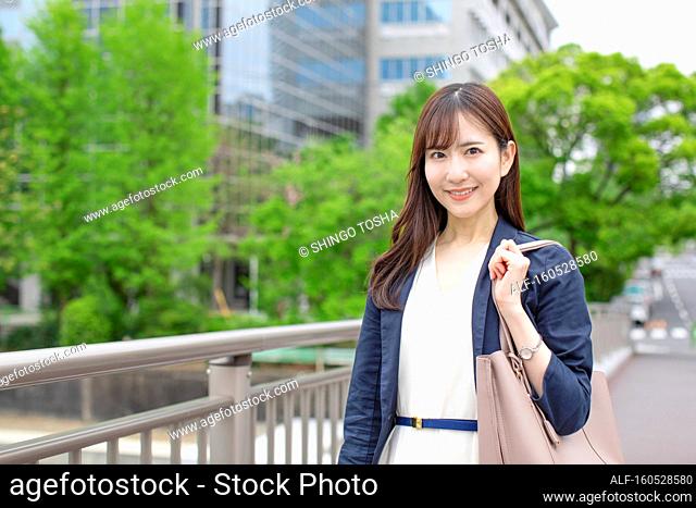 Japanese business woman downtown