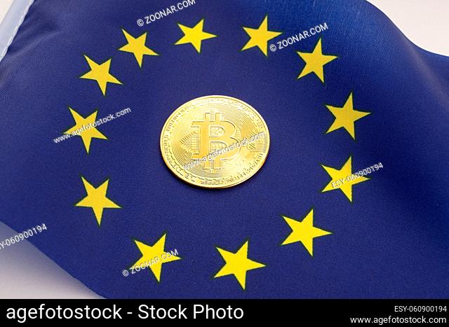 Bitcoin coin on European Union flag. Cryptocurrency on Europe