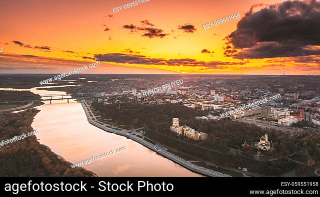 Gomel, Belarus. Aerial View Of City Park Paskeviches Palace And Homiel Cityscape Skyline In Autumn Evening. Residential District And River During Sunset