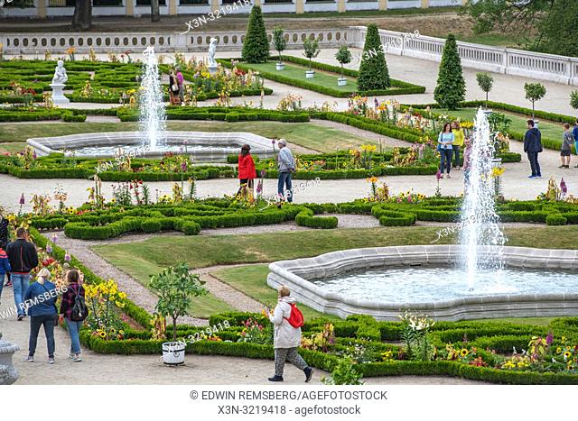 Tourist walk through the gardens at Branicki palace in Bialystok, Poland