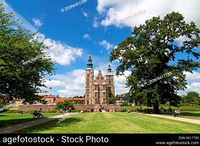 Copenhagen, Denmark - July 19, 2016: Rosenborg Castle and King's Garden with people enjoying the summer