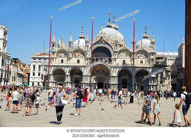 VENICE, ITALY, July 2018, Tourist at the Basilica di San Marco complex in the Piazza di San Marco