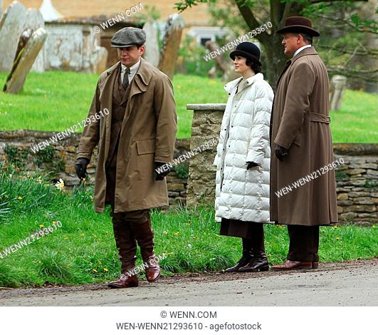 The cast of Downton Abbey film scenes on location outside a churchyard Featuring: Michelle Dockery, Hugh Bonneville Where: Bampton