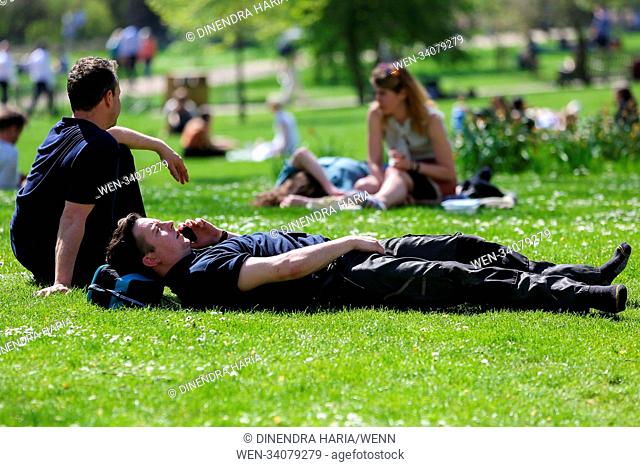 Tourist and Londoners enjoy second day of hot weather in St. James's Park as the temperatures in the capital likely to reach 28 degree celsius
