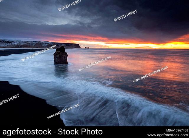 Sunrise on the Black Beach of Iceland with a view of Reynisfjara