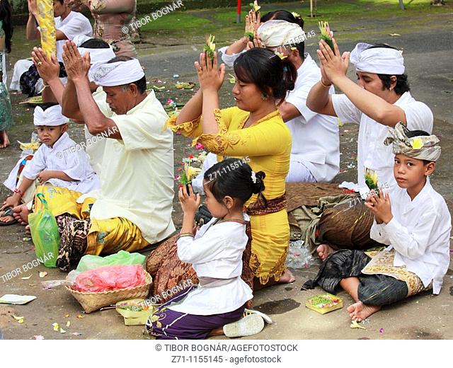 Indonesia, Bali, Mas, temple festival, people praying, odalan, Kuningan holiday