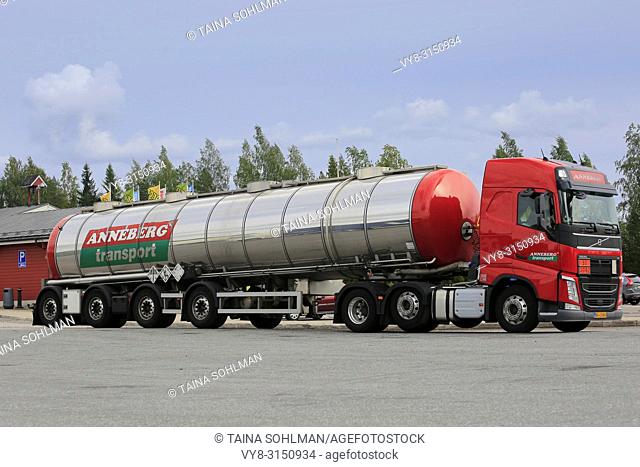 Orivesi, Finland - August 27, 2018: Red Volvo FH semi tank trailer Anneberg Transport on truck stop. ADR 90-3082 signifies pyraclostrobin. a fungicide