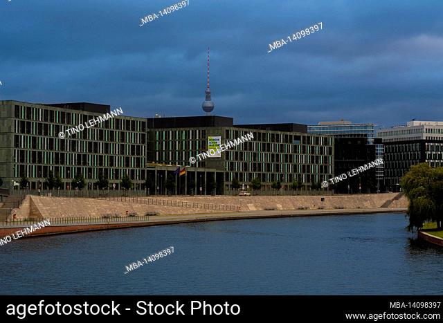 august 17, 2021, berlin, germany, view over the river spree in the early morning, in the background large buildings and the tv tower