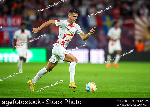 15 October 2022, Saxony, Leipzig: Soccer: Bundesliga, Matchday 10, RB Leipzig - Hertha BSC at the Red Bull Arena. Leipzig's player Andre Silva on the ball