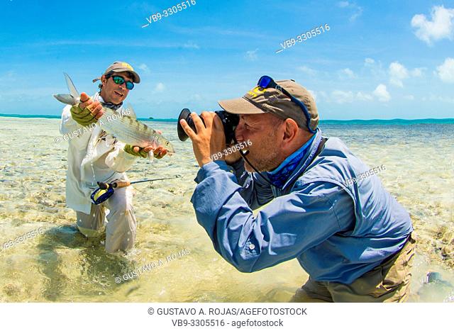 Man holding bonefish los roques - venezuela