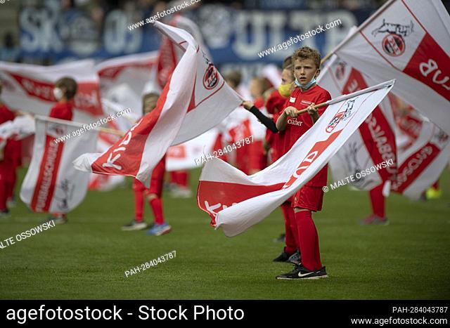 Children wave the flags of FC Cologne Soccer 1st Bundesliga 31st matchday FC Cologne (K) - Arminia Bielefeld (BI) 3: 1 on February 23rd, 2022 in Koeln/ Germany