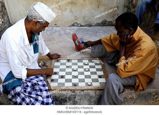 Kenya, Lamu island, Lamu city listed as World Heritage by UNESCO, chess players