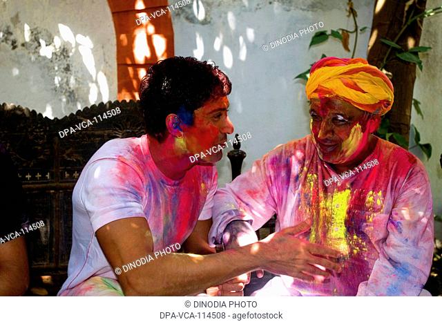 South Asian Indian Bollywood writer Javed Akhtar with son Farhan Akhtar at Holi festival , India NO MR