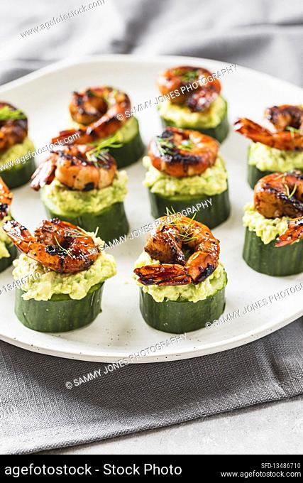 Cucumber rounds, smashed avocado, glazed prawn topped with fresh dill herbs