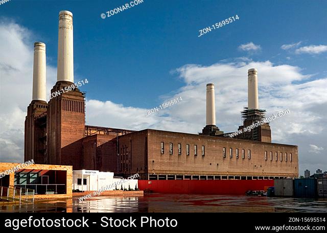 London, United Kingdom - October 01, 2006: Empty reception and entrance of decommissioned (in 1983) coal Battersea power station with one of iconic four white...