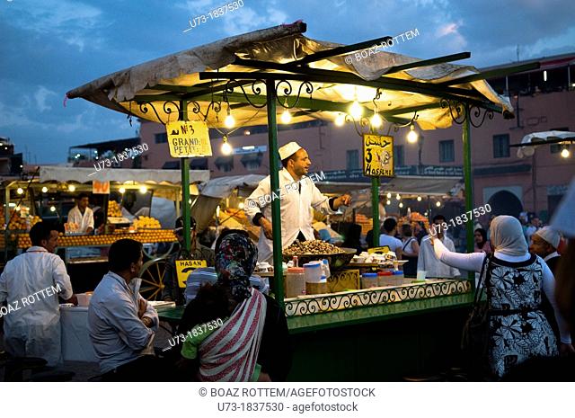 A local snails food stall at the night market in Marrakesh's Djema el fna sq