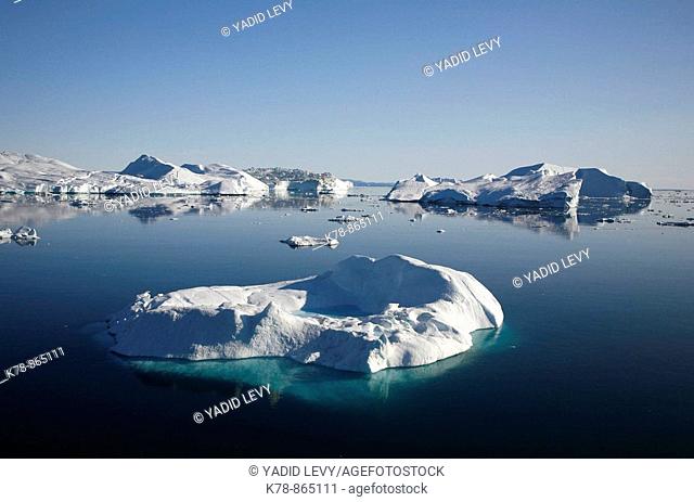 Floating icebergs from the Ilulissat Kangerlua Glacier also known as Sermeq Kujalleq at Disko Bay, Greenland