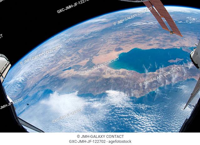 The Gulf of California (also known as the Sea of Cortez) and the Salton Sea, share this scene with a tiny part of the space shuttle Discovery (starboard wing at...