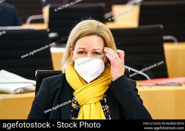 25 March 2021, Hessen, Wiesbaden: Nancy Faeser (SPD), chairwoman of the SPD faction in the state parliament, sits in her seat in the plenary hall