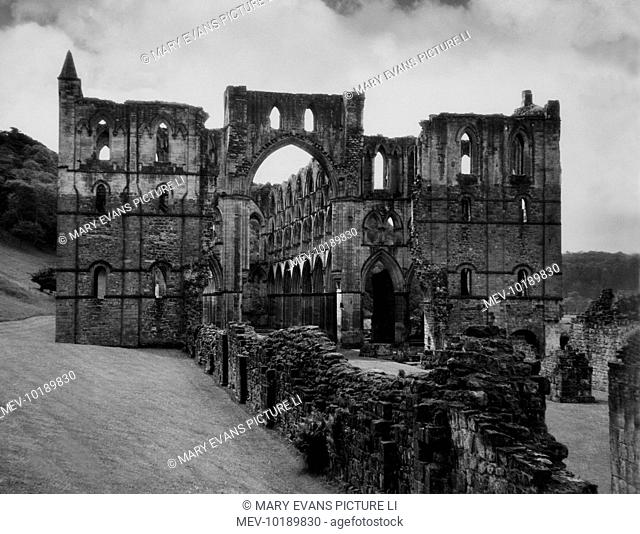 Rievaulx Abbey, Yorkshire, England, was founded by Walter Espec in 1131, the first Cistercian abbey in Yorkshire. The present ruins mostly date from the 13th...