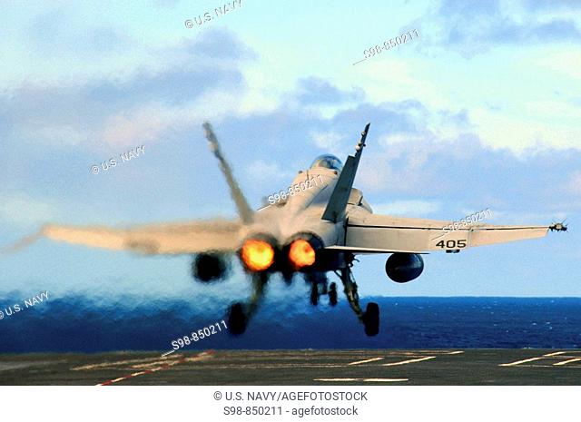 PACIFIC OCEAN (Feb. 25, 2009) An F/A-18C Hornet , assigned to the Sidewinders of Strike Fighter Squadron (VFA) 86, launches off the flight deck of the...