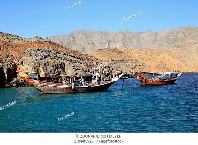 Dhows in the fjord Khor Ash Sham in Oman