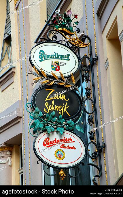 Decorated pub sign in historic town center of Wiesbaden, Hesse, Germany. Wiesbaden is one of the oldest spa towns in Europe
