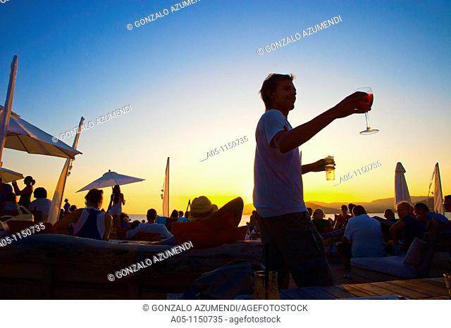 Restaurant Cap des Falco. Chiringuito. Es Codolar Beach. Ses Salines Natural Park. Young people enjoying the Sunset. Ibiza. Balearic Islands  Spain