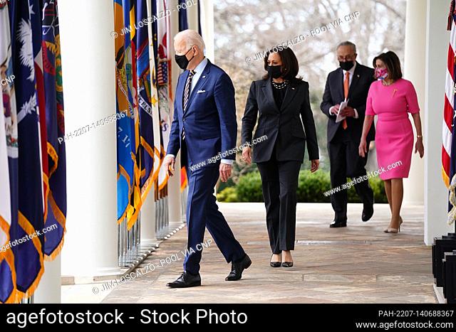 (L-R) US President Joe Biden, Vice President Kamala Harris, Senate Majority Leader Chuck Schumer and Speaker of the House Nancy Pelosi arrive to deliver remarks...