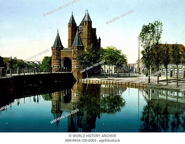 photomechanical print dated to 1900, depicting the Amsterdamse Poort; city gate of Haarlem, Netherlands. It is located at the end of the old route from...