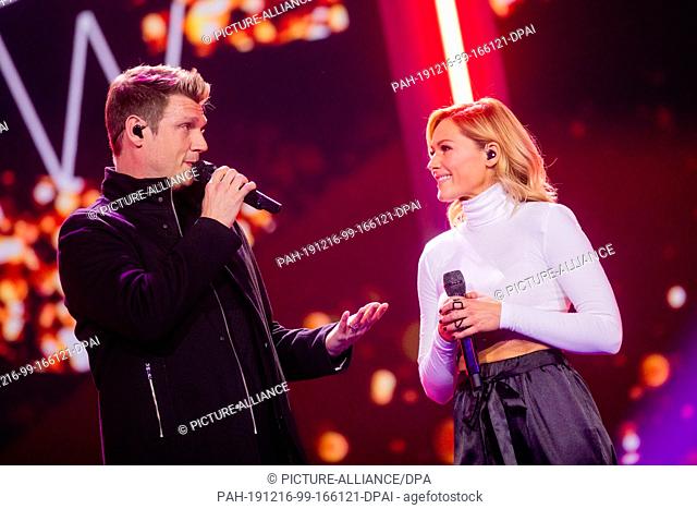 14 December 2019, North Rhine-Westphalia, Duesseldorf: Helene Fischer and Nick Carter will perform during the recording of the Helene Fischer Show in Hall 6